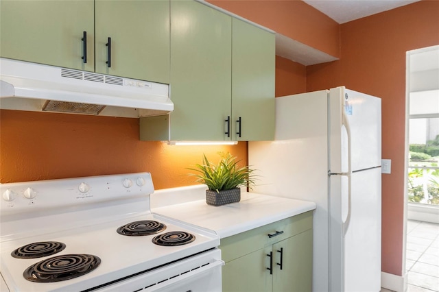 4475 Sandner Dr, Sarasota, FL 34243 - kitchen featuring under cabinet range hood, white appliances, green cabinets, light countertops, and light tile patterned flooring