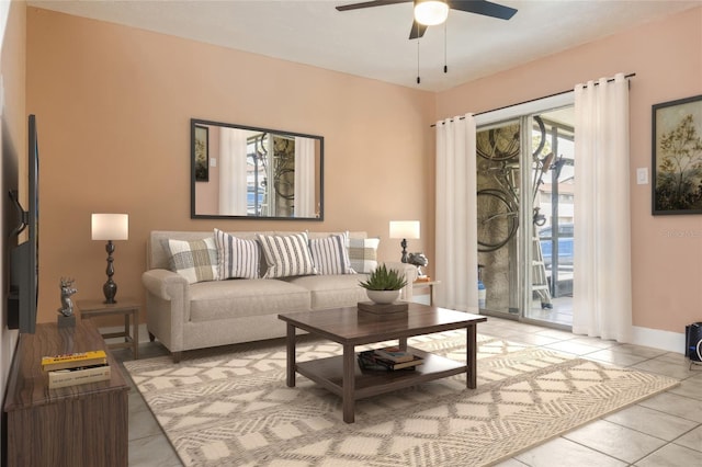 4475 Sandner Dr, Sarasota, FL 34243 - living area featuring light tile patterned floors, a ceiling fan, and baseboards
