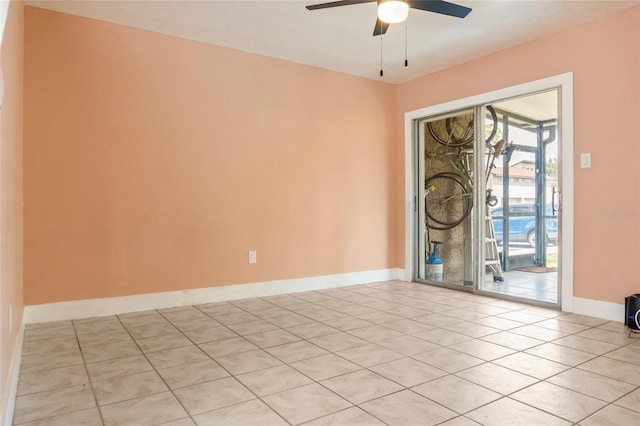 4475 Sandner Dr, Sarasota, FL 34243 - empty room featuring light tile patterned floors, ceiling fan, and baseboards