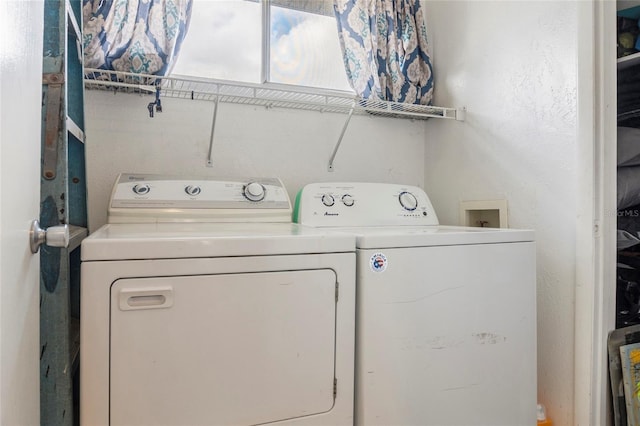 4475 Sandner Dr, Sarasota, FL 34243 - laundry room featuring washing machine and clothes dryer
