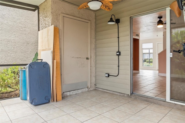 4475 Sandner Dr, Sarasota, FL 34243 - property entrance with a ceiling fan