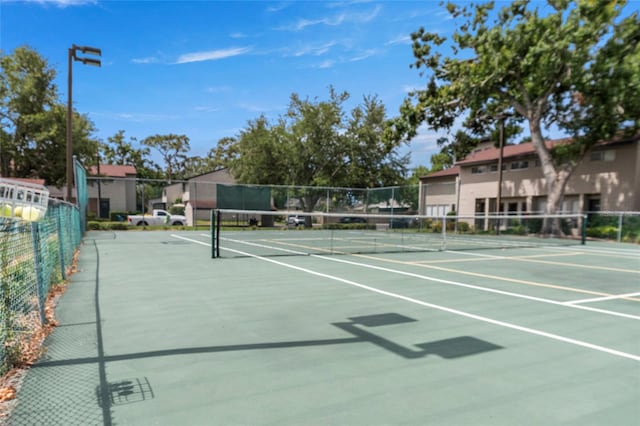 4475 Sandner Dr, Sarasota, FL 34243 - view of tennis court featuring community basketball court