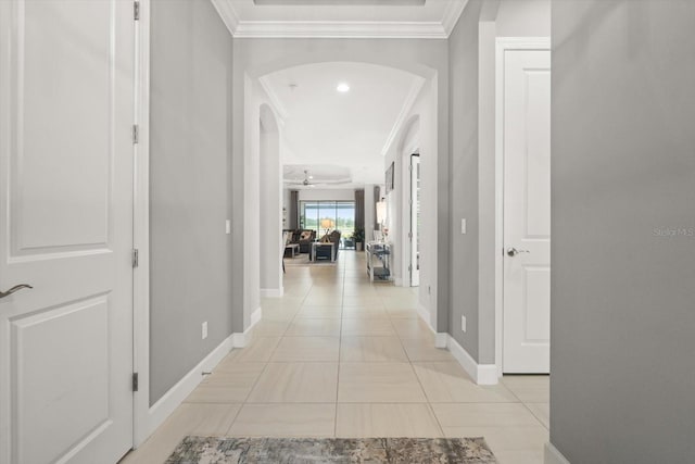 12856 Sorrento Way, Bradenton, FL 34211 - hall with arched walkways, crown molding, and baseboards