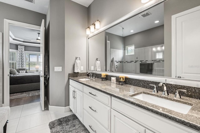 12856 Sorrento Way, Bradenton, FL 34211 - ensuite bathroom featuring double vanity, plenty of natural light, ceiling fan, and a shower