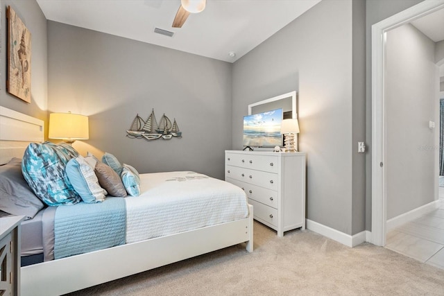 12856 Sorrento Way, Bradenton, FL 34211 - bedroom featuring light colored carpet, baseboards, and a ceiling fan