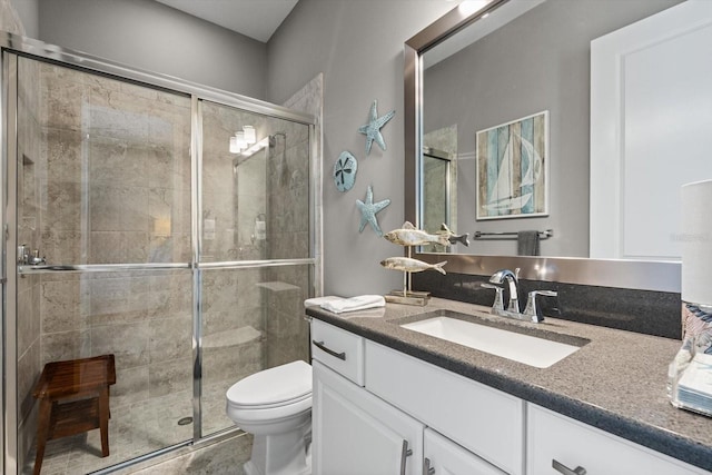 12856 Sorrento Way, Bradenton, FL 34211 - bathroom featuring toilet, vanity, and a stall shower