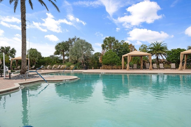 12856 Sorrento Way, Bradenton, FL 34211 - community pool with a gazebo, a hot tub, and a patio area