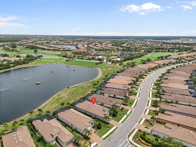 12856 Sorrento Way, Bradenton, FL 34211 - aerial overview of property's location featuring a golf course, nearby suburban area, and a large body of water