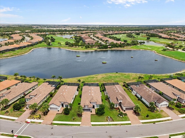 12856 Sorrento Way, Bradenton, FL 34211 - aerial view of property and surrounding area with nearby suburban area, a large body of water, and a local golf course