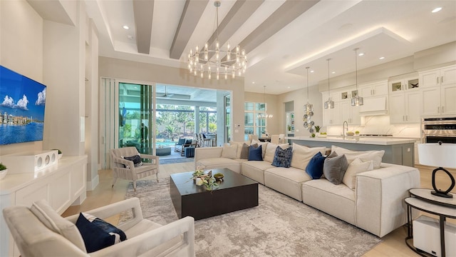 7838 Bowspirit Way, Lakewood Ranch, FL 34202 - living room featuring a chandelier and recessed lighting