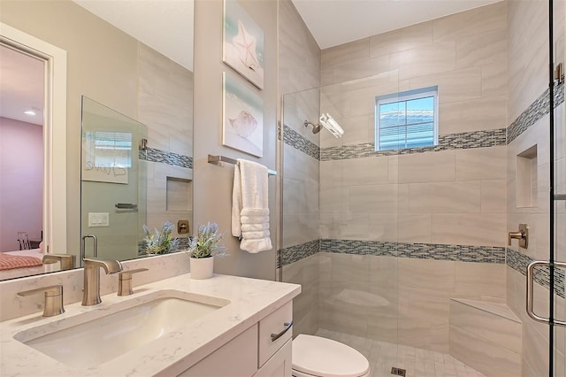 7838 Bowspirit Way, Lakewood Ranch, FL 34202 - bathroom with a shower stall, toilet, and vanity