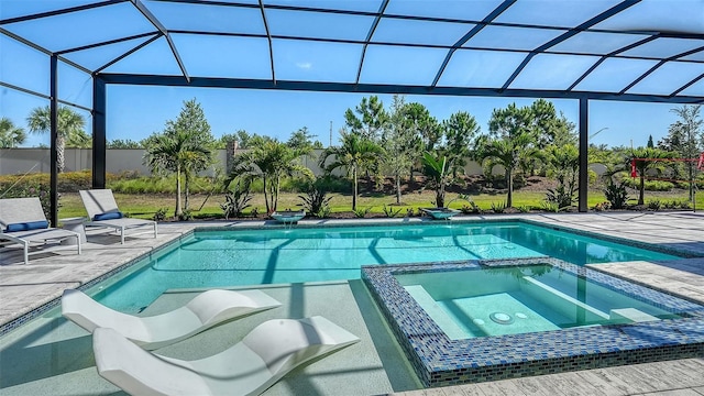 7838 Bowspirit Way, Lakewood Ranch, FL 34202 - view of swimming pool with a pool with connected hot tub, a patio area, and glass enclosure