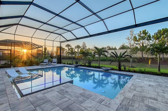 7838 Bowspirit Way, Lakewood Ranch, FL 34202 - pool at dusk featuring a patio and an outdoor pool