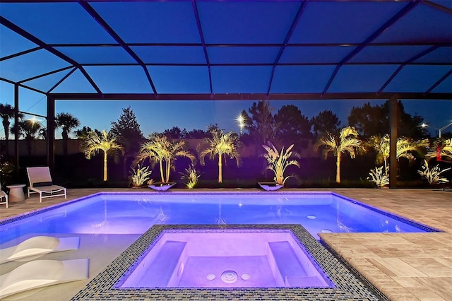 7838 Bowspirit Way, Lakewood Ranch, FL 34202 - pool at twilight featuring a patio area, a pool with connected hot tub, and glass enclosure