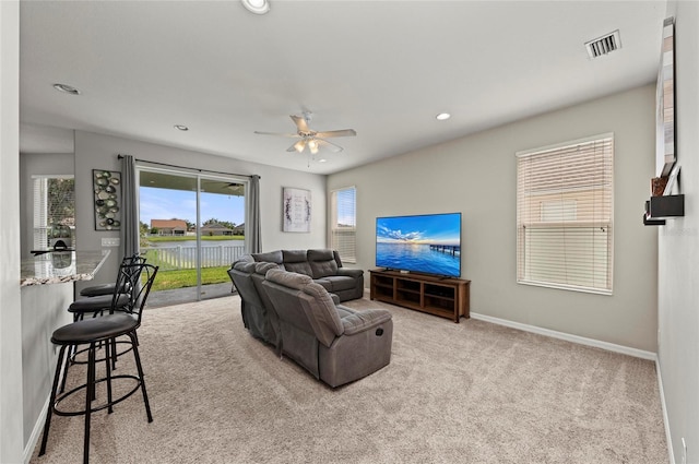 5224 58th Ter E, Bradenton, FL 34203 - carpeted living area with ceiling fan, baseboards, and recessed lighting