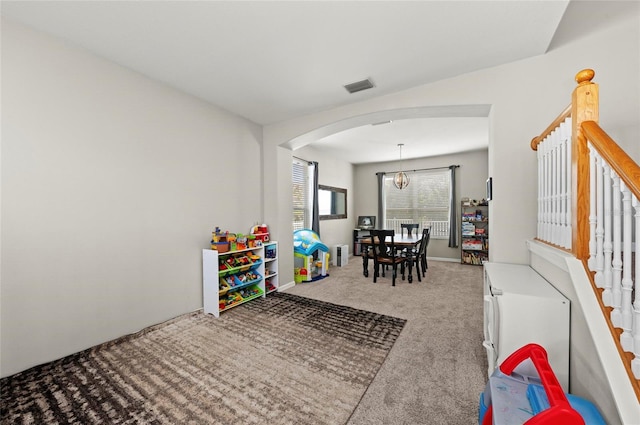 5224 58th Ter E, Bradenton, FL 34203 - game room featuring arched walkways, carpet, and a chandelier