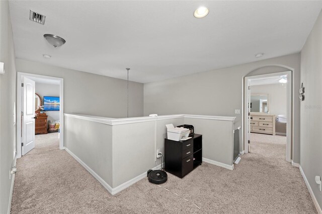 5224 58th Ter E, Bradenton, FL 34203 - hall with an upstairs landing, carpet flooring, and baseboards