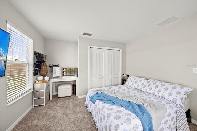 5224 58th Ter E, Bradenton, FL 34203 - carpeted bedroom featuring baseboards and a closet