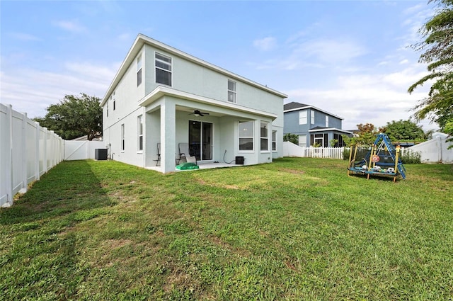 5224 58th Ter E, Bradenton, FL 34203 - rear view of house featuring a ceiling fan, stucco siding, central air condition unit, and a patio area