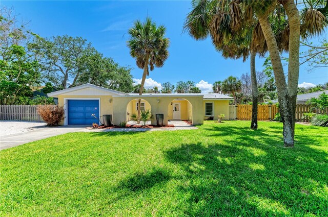 5223 Shadow Lawn Dr, Sarasota, FL 34242 - ranch-style house featuring an attached garage, concrete driveway, and stucco siding