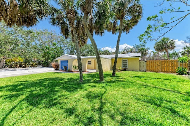 5223 Shadow Lawn Dr, Sarasota, FL 34242 - view of front facade featuring stucco siding, driveway, and a garage