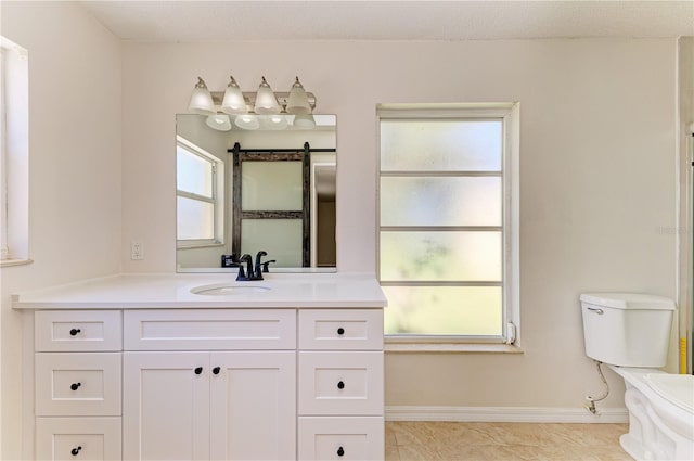 5223 Shadow Lawn Dr, Sarasota, FL 34242 - full bath featuring toilet, vanity, and baseboards