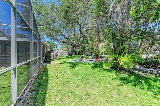 5223 Shadow Lawn Dr, Sarasota, FL 34242 - view of yard featuring a patio area and glass enclosure