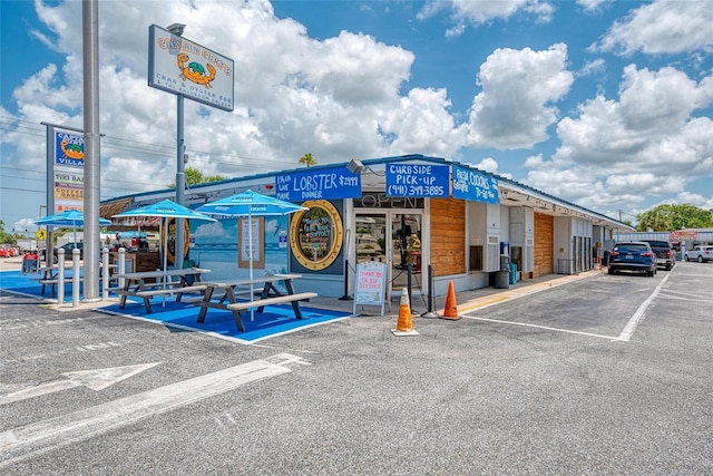 5223 Shadow Lawn Dr, Sarasota, FL 34242 - view of commercial property with uncovered parking