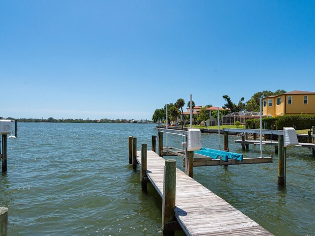7614 Peninsular Dr, Sarasota, FL 34231 - dock with a water view and boat lift