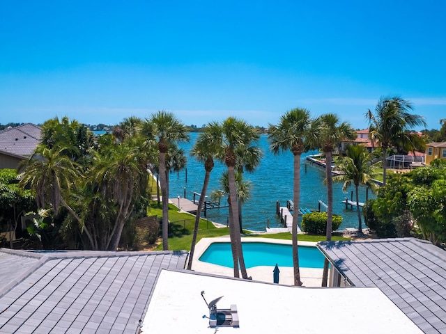 7614 Peninsular Dr, Sarasota, FL 34231 - outdoor pool with a water view, a patio area, and a boat dock