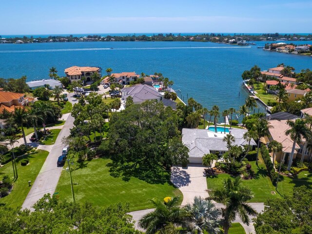 7614 Peninsular Dr, Sarasota, FL 34231 - aerial perspective of suburban area featuring a large body of water and a pool