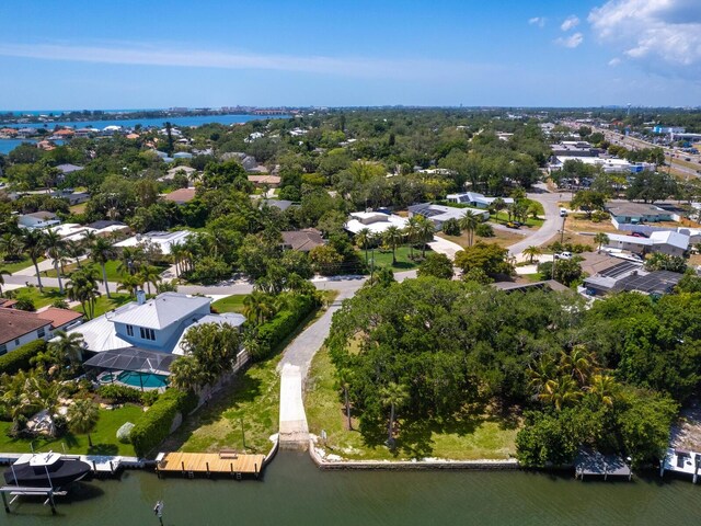 7614 Peninsular Dr, Sarasota, FL 34231 - aerial view of residential area with a nearby body of water