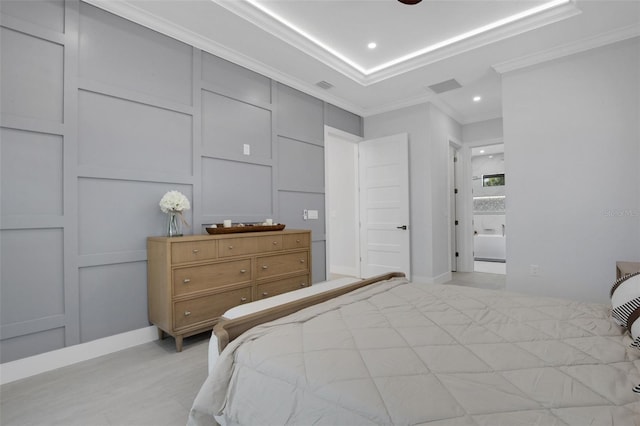 805 Padua Ct, Nokomis, FL 34275 - bedroom with crown molding, recessed lighting, baseboards, light wood-style floors, and connected bathroom