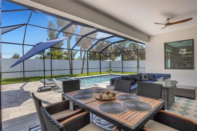 805 Padua Ct, Nokomis, FL 34275 - fenced backyard featuring a patio, ceiling fan, glass enclosure, and outdoor lounge area