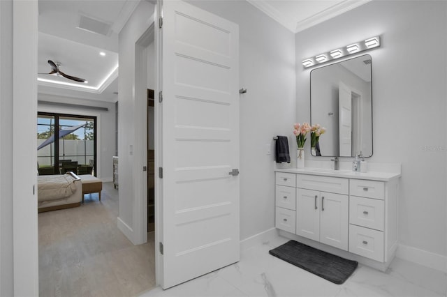 805 Padua Ct, Nokomis, FL 34275 - bathroom with baseboards, vanity, ornamental molding, connected bathroom, and marble finish flooring