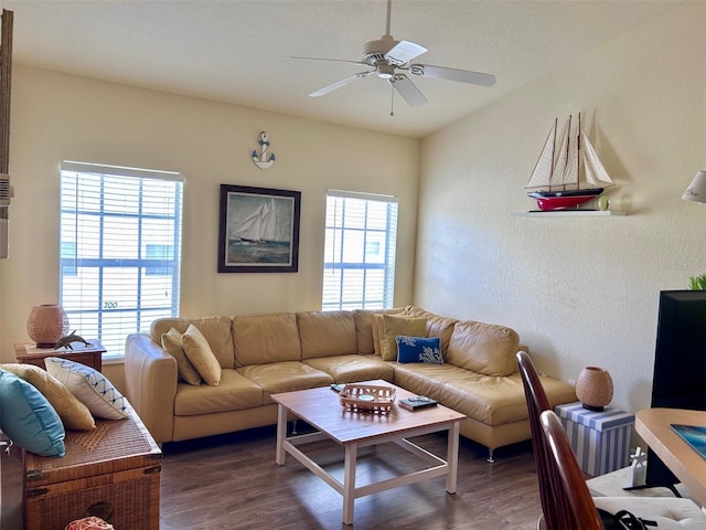 600 Mirabella Cir Unit 201, Venice, FL 34292 - living area featuring wood finished floors, ceiling fan, and a textured wall