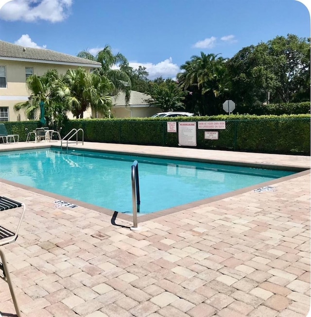 600 Mirabella Cir Unit 201, Venice, FL 34292 - community pool with a patio