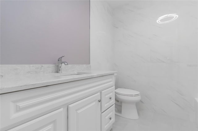 2477 Wood Oak Dr, Sarasota, FL 34232 - bathroom featuring vanity and toilet