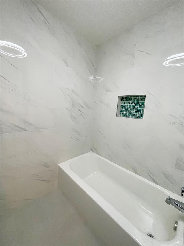 2477 Wood Oak Dr, Sarasota, FL 34232 - bathroom featuring shower / tub combination