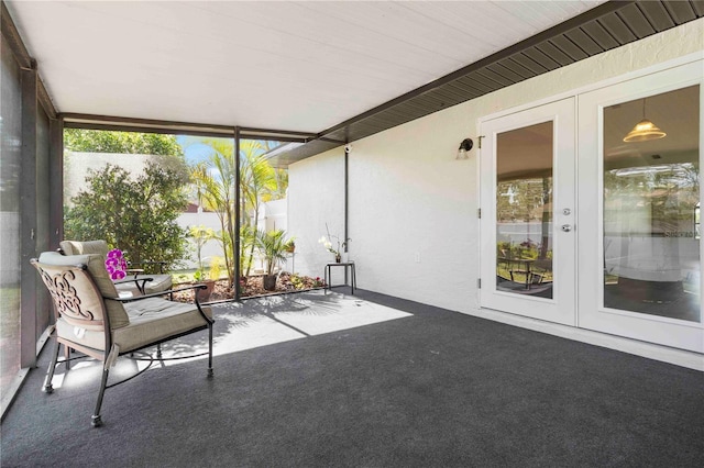 2477 Wood Oak Dr, Sarasota, FL 34232 - unfurnished sunroom featuring french doors