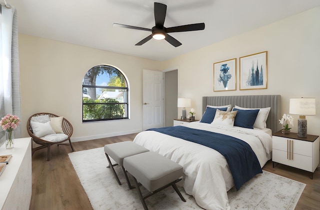 2477 Wood Oak Dr, Sarasota, FL 34232 - bedroom with wood finished floors and ceiling fan