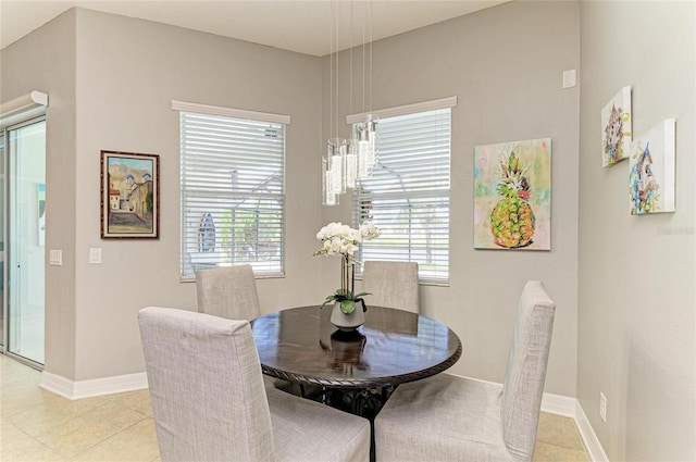 5319 120th Ave E, Parrish, FL 34219 - dining room featuring plenty of natural light, baseboards, and light tile patterned floors