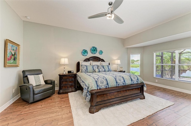5319 120th Ave E, Parrish, FL 34219 - bedroom featuring light wood-style flooring, baseboards, and ceiling fan