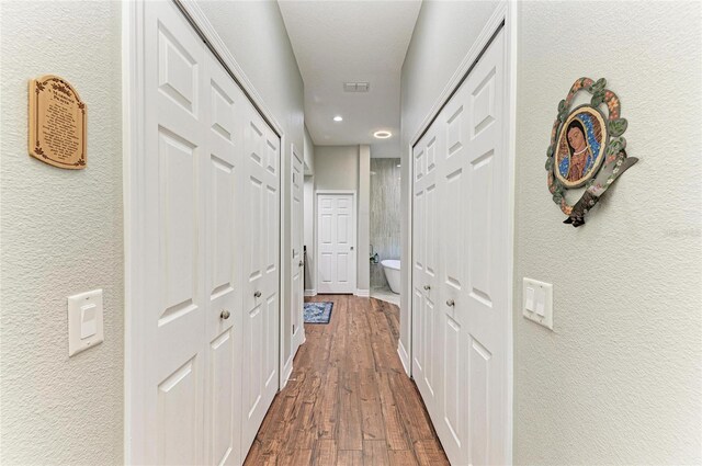 5319 120th Ave E, Parrish, FL 34219 - corridor featuring dark wood-style floors, recessed lighting, and a textured wall