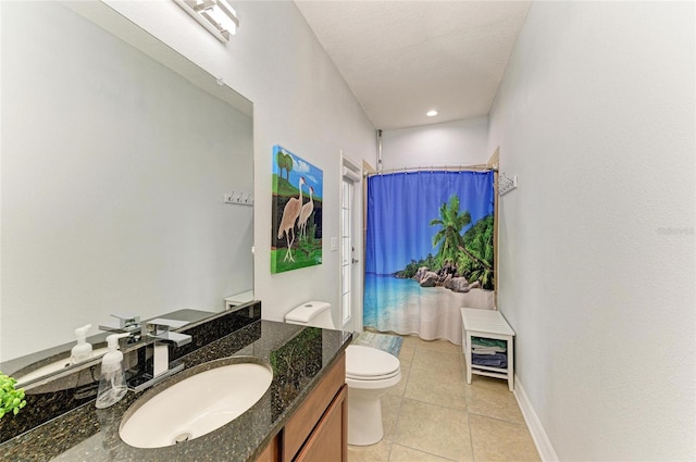 5319 120th Ave E, Parrish, FL 34219 - full bathroom with toilet, vanity, and tile patterned flooring