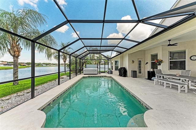 5319 120th Ave E, Parrish, FL 34219 - outdoor pool with a patio, a water view, glass enclosure, and a ceiling fan