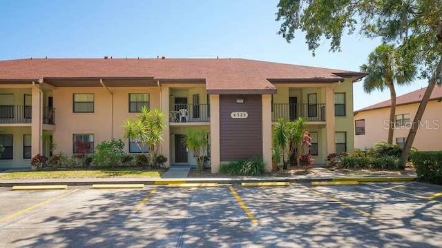4325 46th Ave W Unit 203, Bradenton, FL 34210 - view of property with uncovered parking