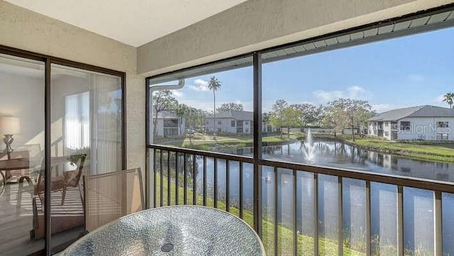 4325 46th Ave W Unit 203, Bradenton, FL 34210 - sunroom / solarium with a water view