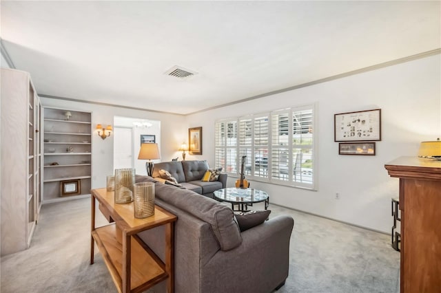 965 E Gondola Dr, Venice, FL 34293 - living area with light carpet and a chandelier