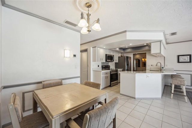 965 E Gondola Dr, Venice, FL 34293 - dining space featuring crown molding, a chandelier, and light tile patterned floors
